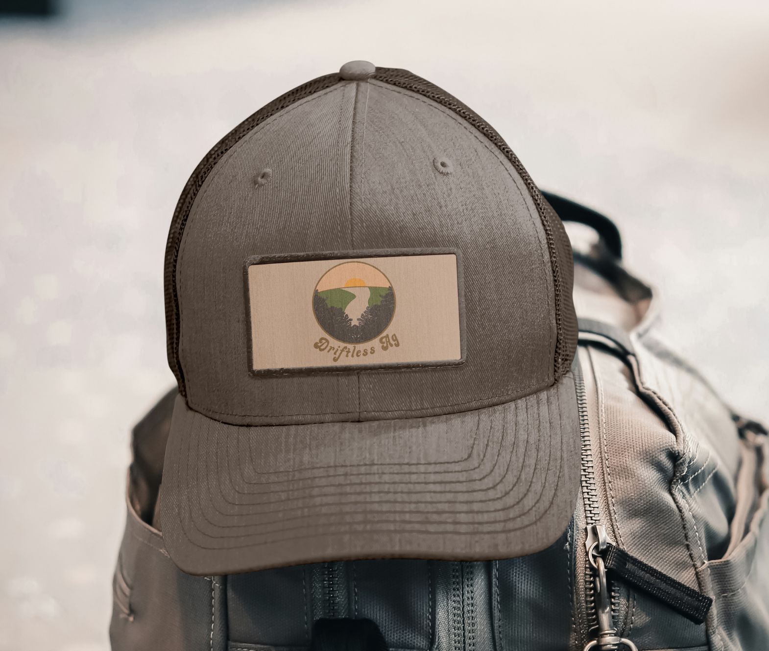 A trucker hat mockup for Driftless Ag